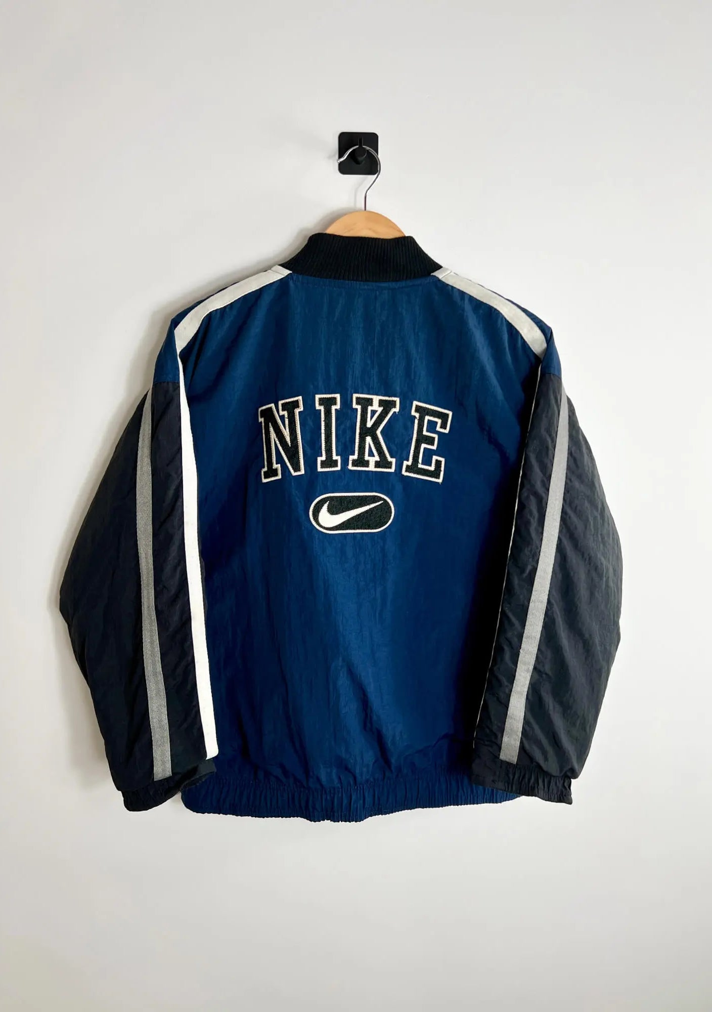 Bomber Homme Nike Bleu vue de dos