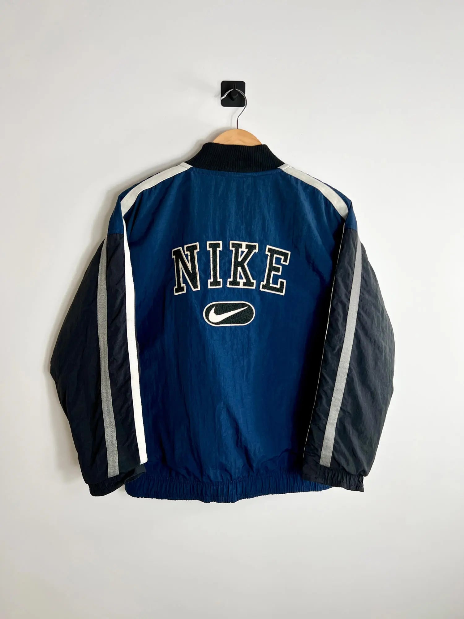 Bomber Homme Nike Bleu vue de dos