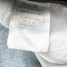 Jean Carhartt WIP Klondike Pant effet usé vue de l'étiquette