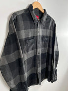 Camisa Supreme de franela negra a cuadros FW21 vista lateral