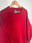 sweatshirt ralph lauren vintage rouge avec logo ralph lauren brodé bleu vue du logo