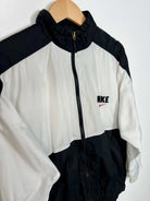 Nike Track Jacket Vintage 1990s Noir Blanc vue de dos