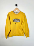 Pull Nike Vintage 90's Jaune Logo Brodé vue de face