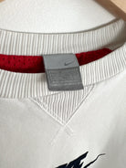 Sweat Nike Vintage 00s blanc avec logo nike noir vue de etiquette