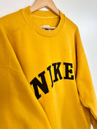 Sweat Nike Vintage 90's Jaune Logo Brodé vue du logo