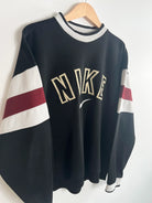 Sweat Nike Vintage 90s noir avec Nike brode vue de coter