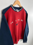 Vintage Nike 90s Sweatshirt Rouge et Bleu vue du logo nike