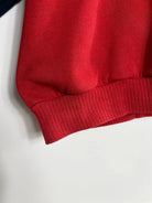 Vintage Nike 90s Sweatshirt Rouge et Bleu vue bas du sweat niveau de la taille